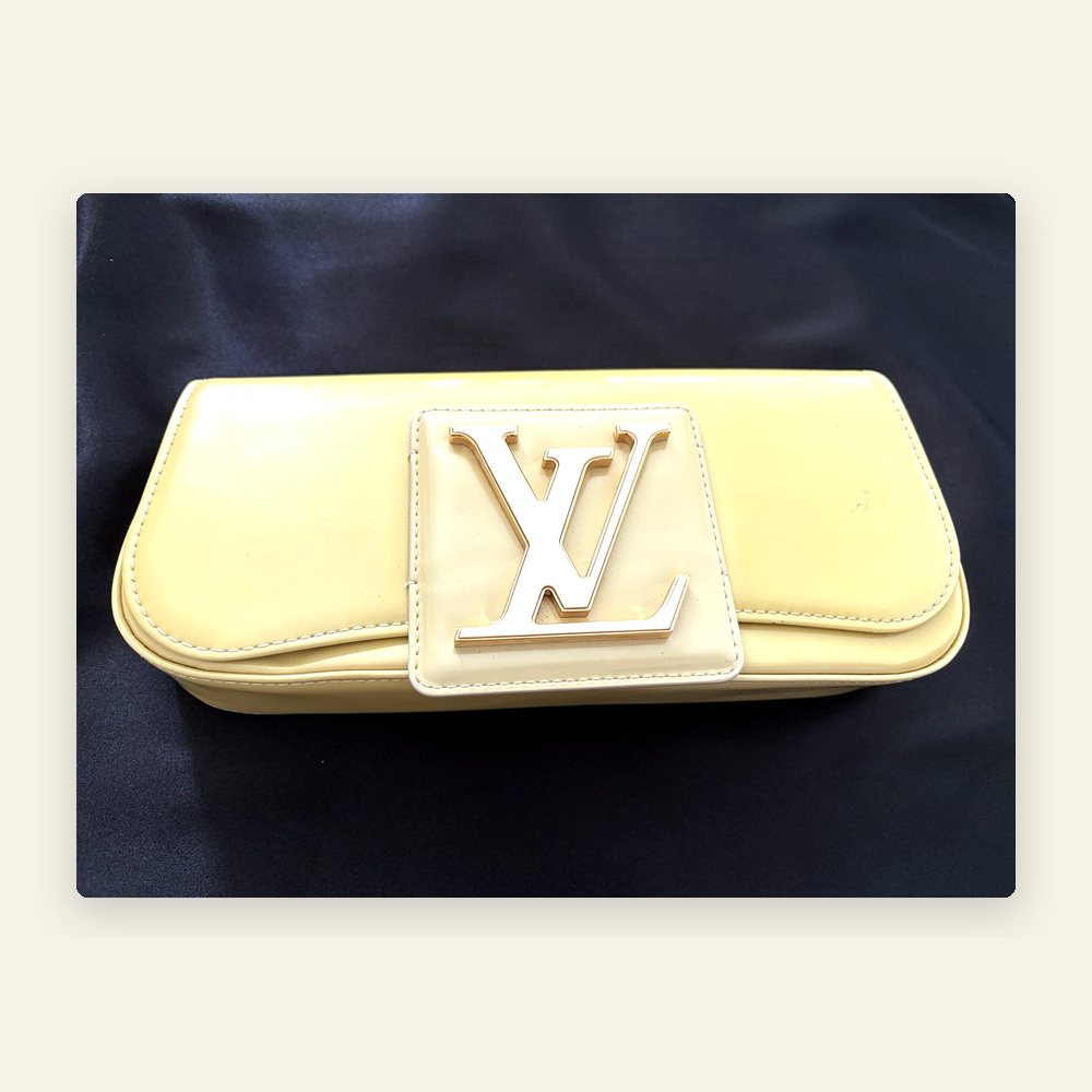 Louis Vuitton yellow patent clutch